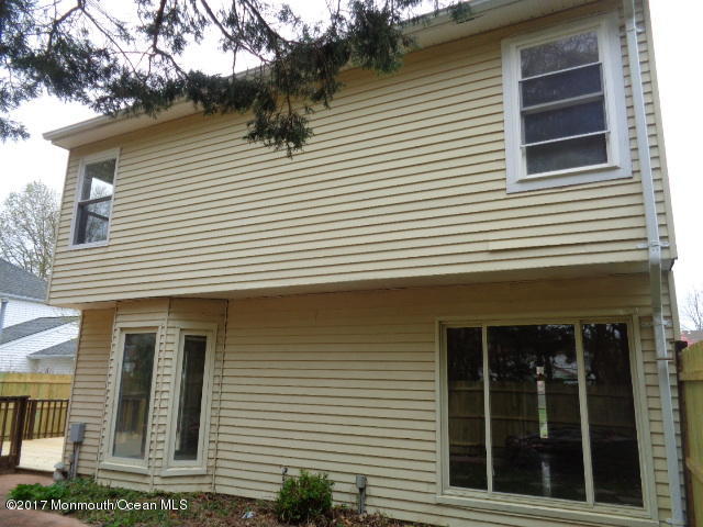 7 Sweet Gum Road Howell, NJ 07731 - Photo 28 of 30 a view of a house with a window and large tree
