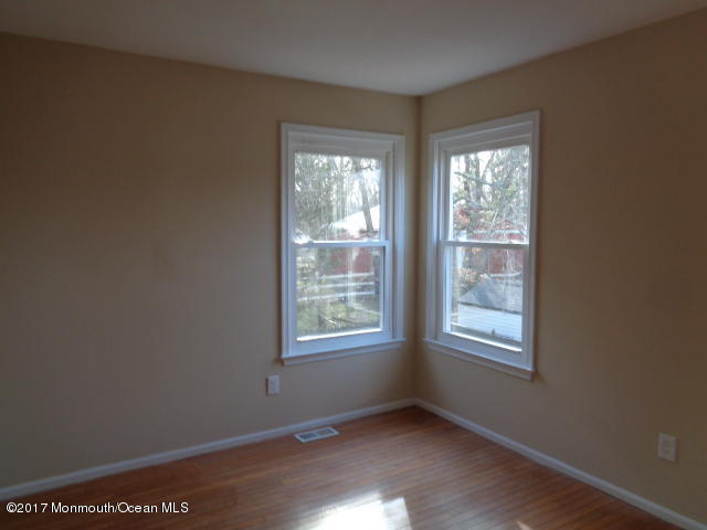 7 Sweet Gum Road Howell, NJ 07731 - Photo 8 of 30 a view of an empty room with a window
