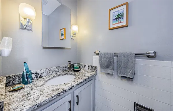 a bedroom with two beds and a window