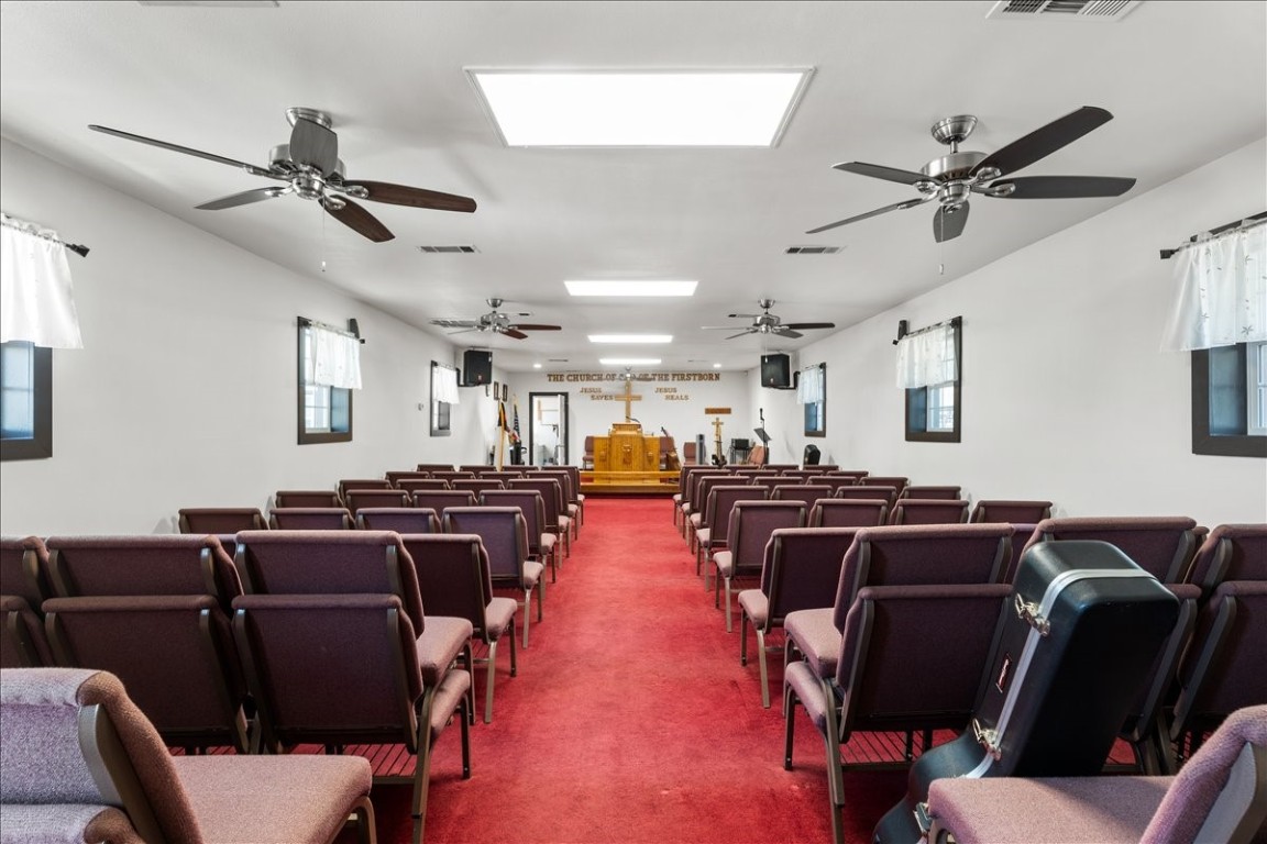 2606 Santa Rosa Street Austin, TX 78702 - Photo 15 of 28 Cinema room featuring carpet flooring