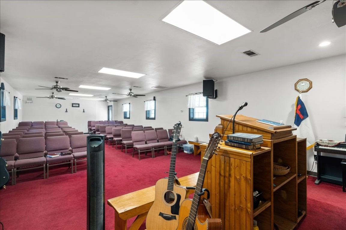 2606 Santa Rosa Street Austin, TX 78702 - Photo 16 of 28 Misc room with ceiling fan and carpet