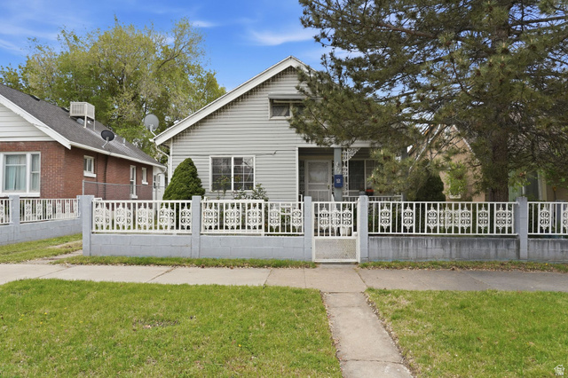 977 23rd Street Ogden, UT 84401 - Photo 1 of 29 Bungalow-style home featuring a fenced front yard