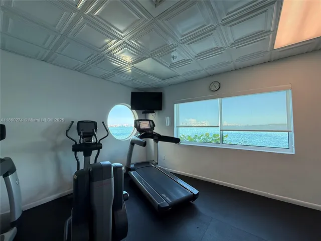 a view of outdoor space with swimming pool and furniture