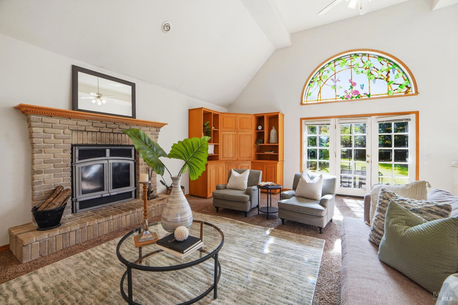 4818 Kieran Court Santa Rosa, CA 95405 - Photo 11 of 51 a living room with furniture fireplace and a large window