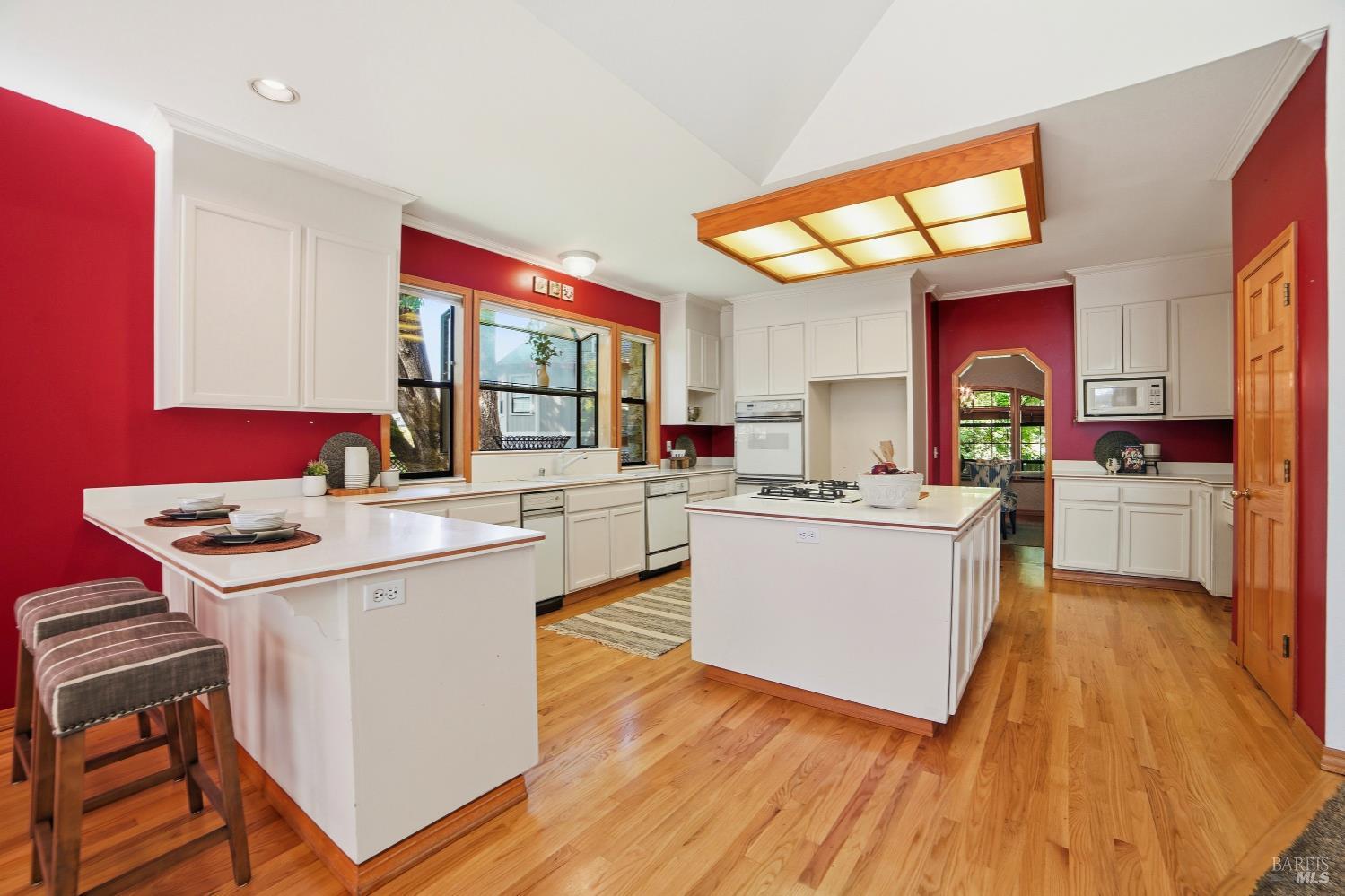 4818 Kieran Court Santa Rosa, CA 95405 - Photo 16 of 51 a kitchen with a sink cabinets and wooden floor