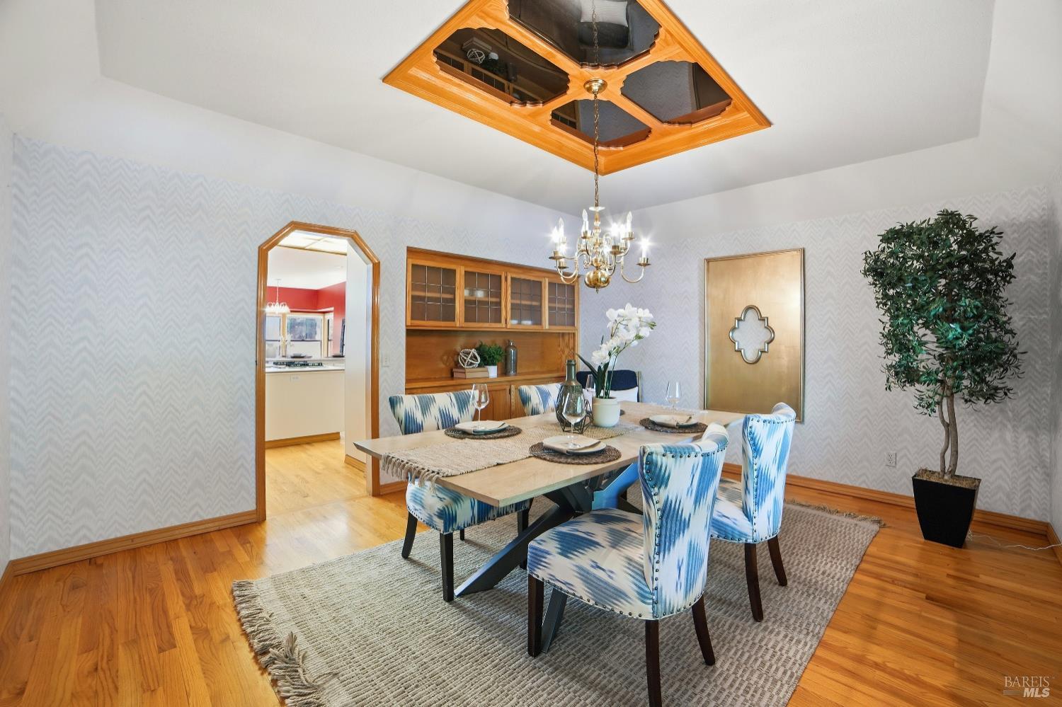 4818 Kieran Court Santa Rosa, CA 95405 - Photo 19 of 51 a view of a dining room with furniture and a potted plant