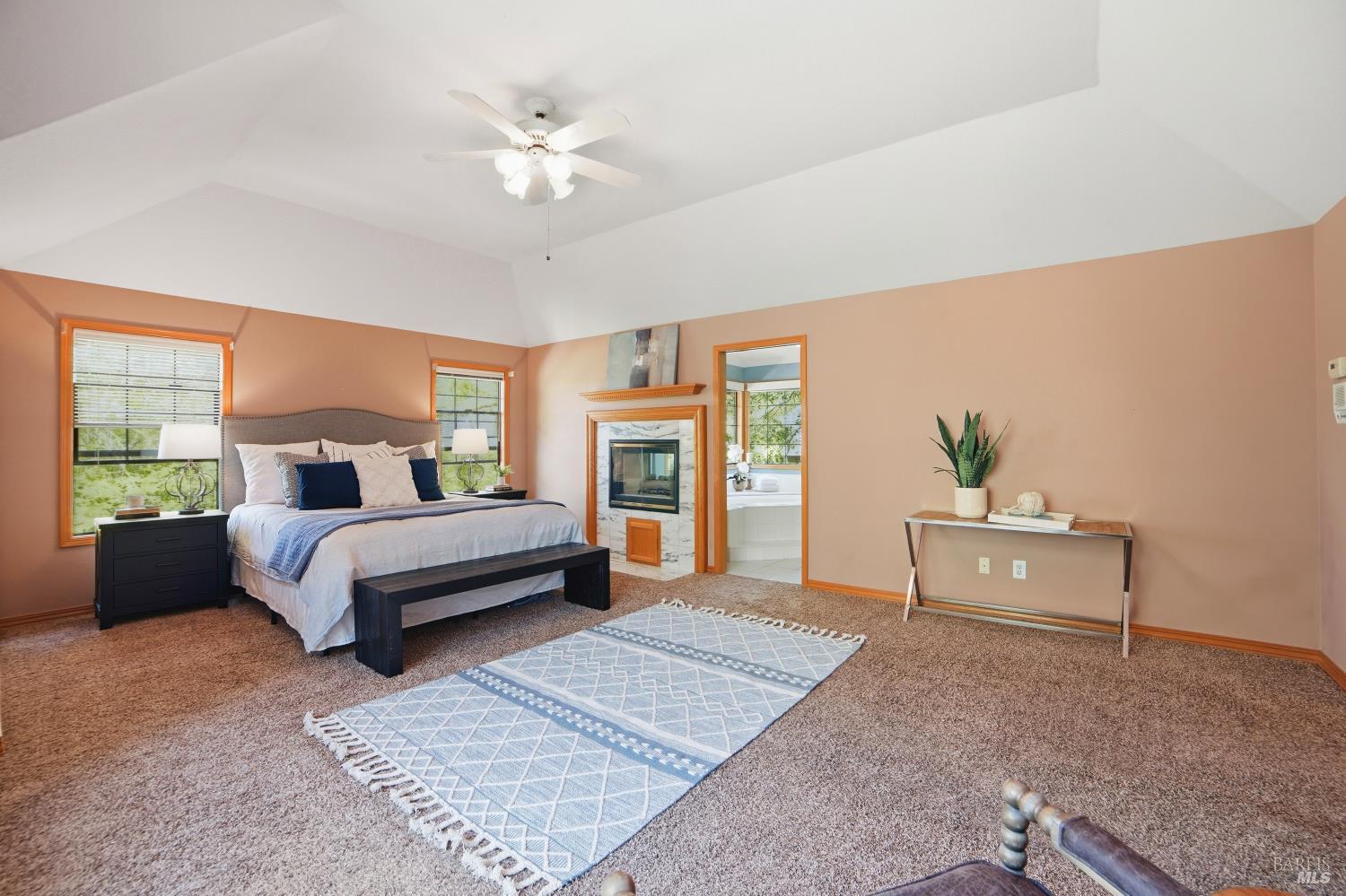 4818 Kieran Court Santa Rosa, CA 95405 - Photo 31 of 51 a bedroom with a large bed and a window