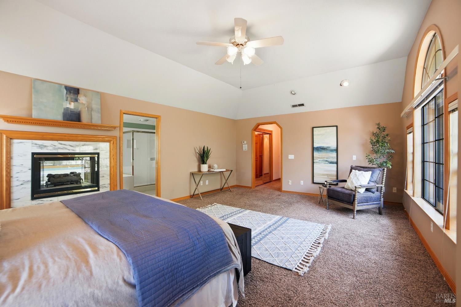 4818 Kieran Court Santa Rosa, CA 95405 - Photo 32 of 51 a bed room with a bed and a fireplace