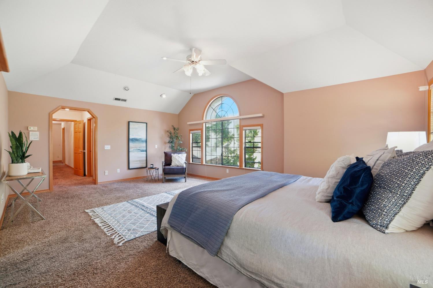 4818 Kieran Court Santa Rosa, CA 95405 - Photo 33 of 51 a spacious bedroom with a large bed and a large window