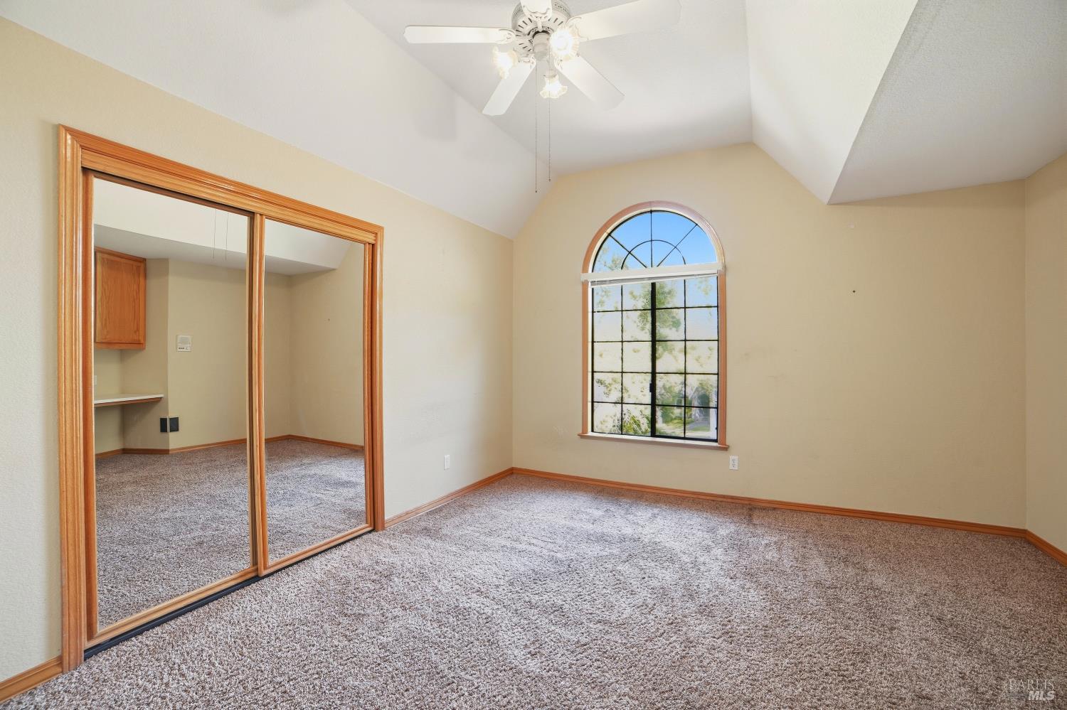 4818 Kieran Court Santa Rosa, CA 95405 - Photo 34 of 51 an empty room that has a window and a ceiling fan