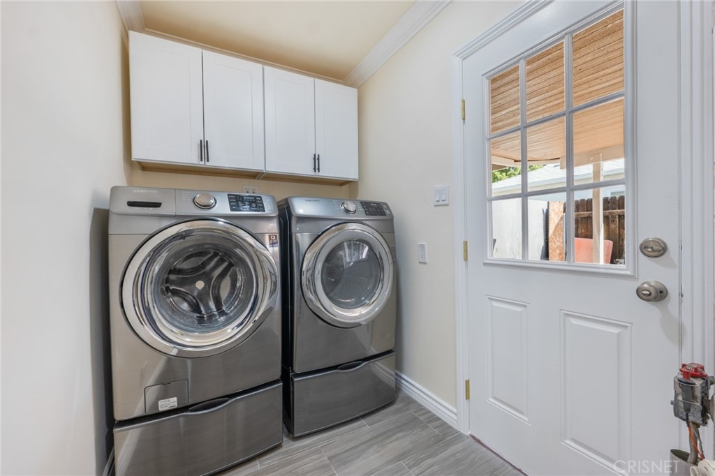 17604 Willard Street Northridge, CA 91325 - Photo 17 of 28 a utility room with dryer and washer