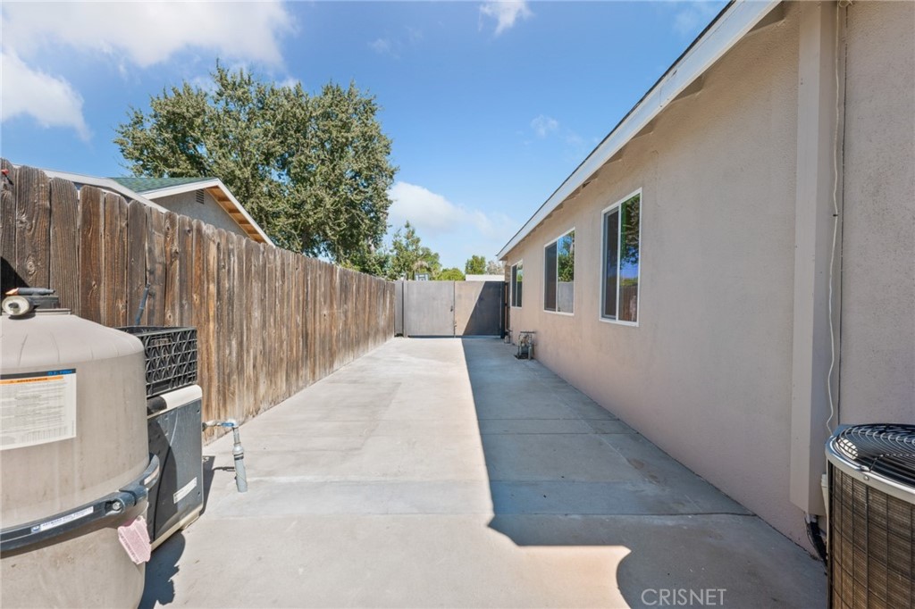 17604 Willard Street Northridge, CA 91325 - Photo 25 of 28 a view of a house with a backyard