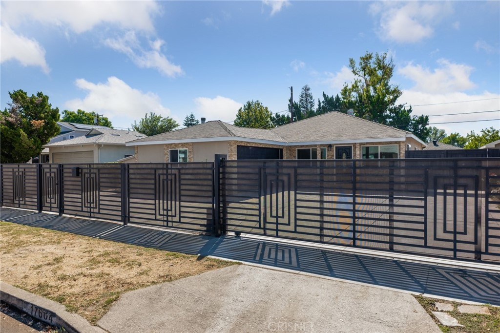 17604 Willard Street Northridge, CA 91325 - Photo 28 of 28 a front view of a house with a yard