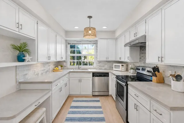 a kitchen with granite countertop lots of counter top space
