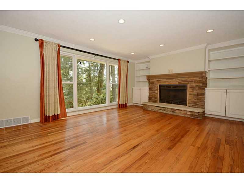 6645 Landview Road Pittsburgh, PA 15217 - Photo 3 of 18 Living Room. Expansive LR with gleaming HW floors and stacked stoneFP