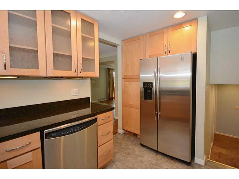6645 Landview Road Pittsburgh, PA 15217 - Photo 7 of 18 Kitchen. Glass front maple cabinets and SS appliances