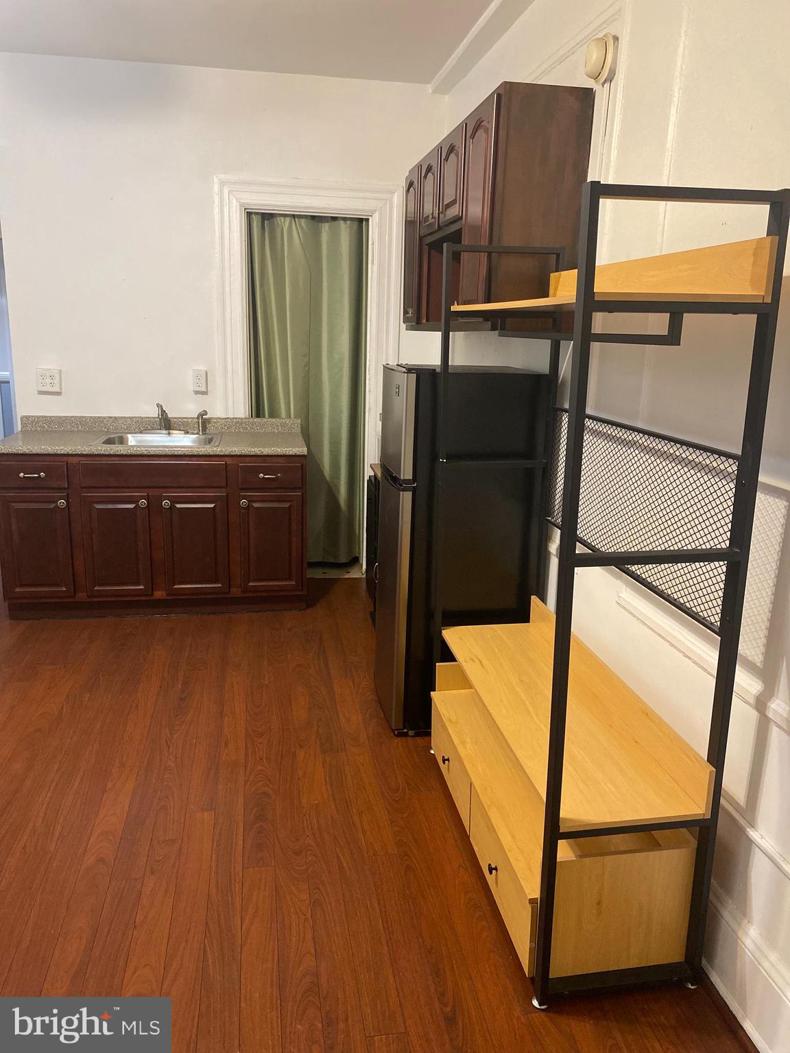 1324 Locust Street, Unit 308 Philadelphia, PA 19107 - Photo 6 of 11 a view of walk in closet with clothes and shoes