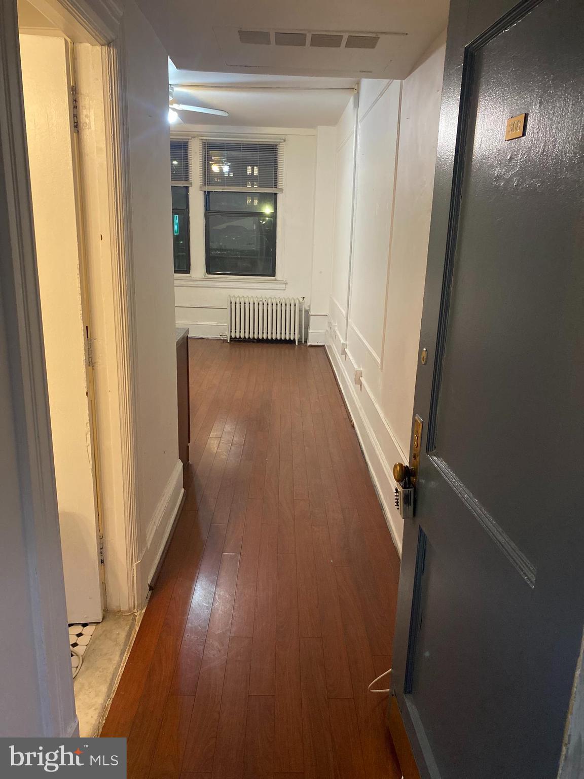 1324 Locust Street, Unit 308 Philadelphia, PA 19107 - Photo 8 of 11 a view of gallery with wooden floor