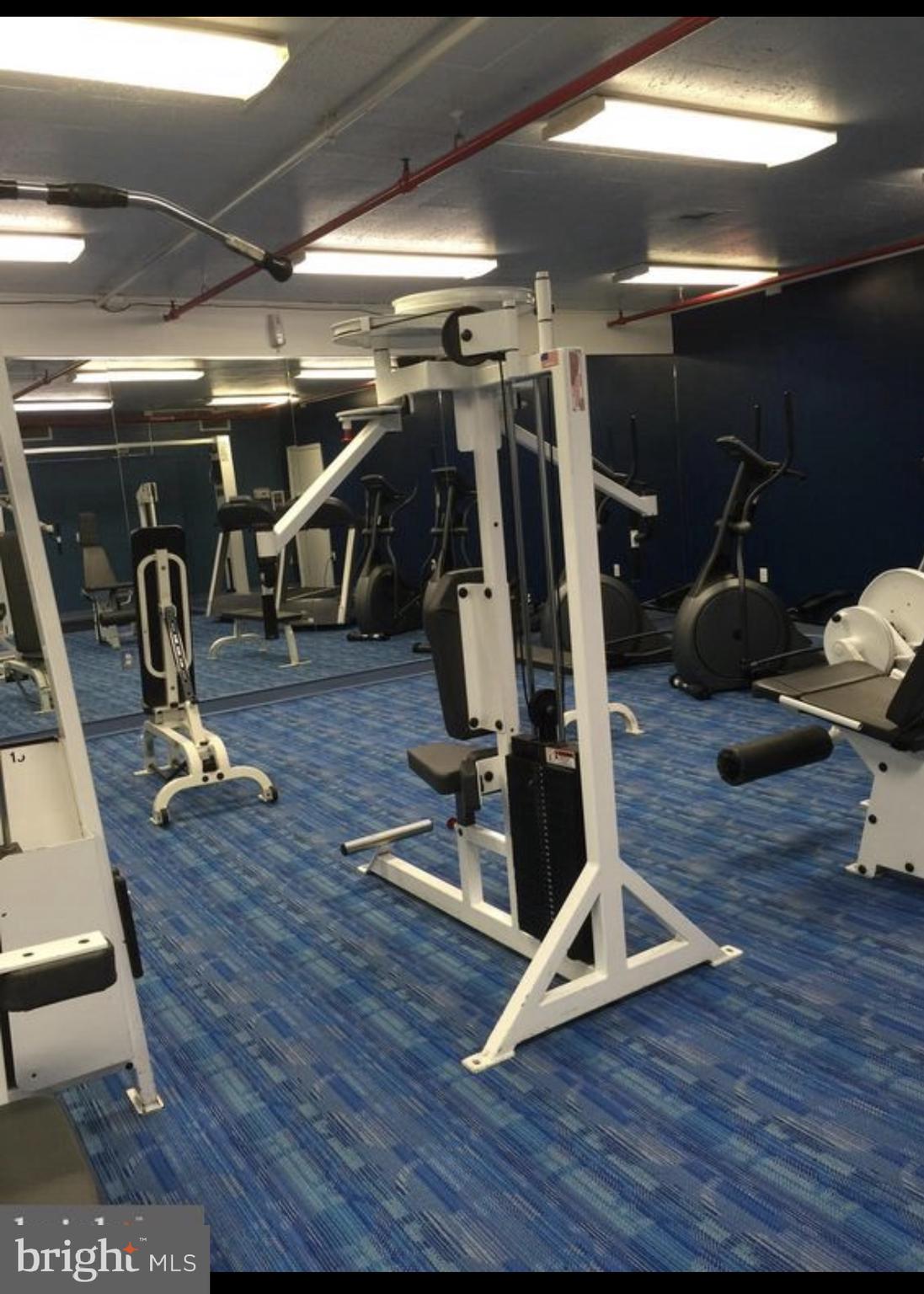 1324 Locust Street, Unit 308 Philadelphia, PA 19107 - Photo 9 of 11 a view of a room with gym equipment