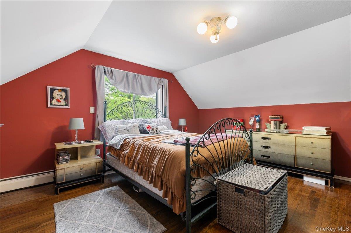 6 Apex Road Melville, NY 11747 - Photo 30 of 50 a bedroom with a bed and window