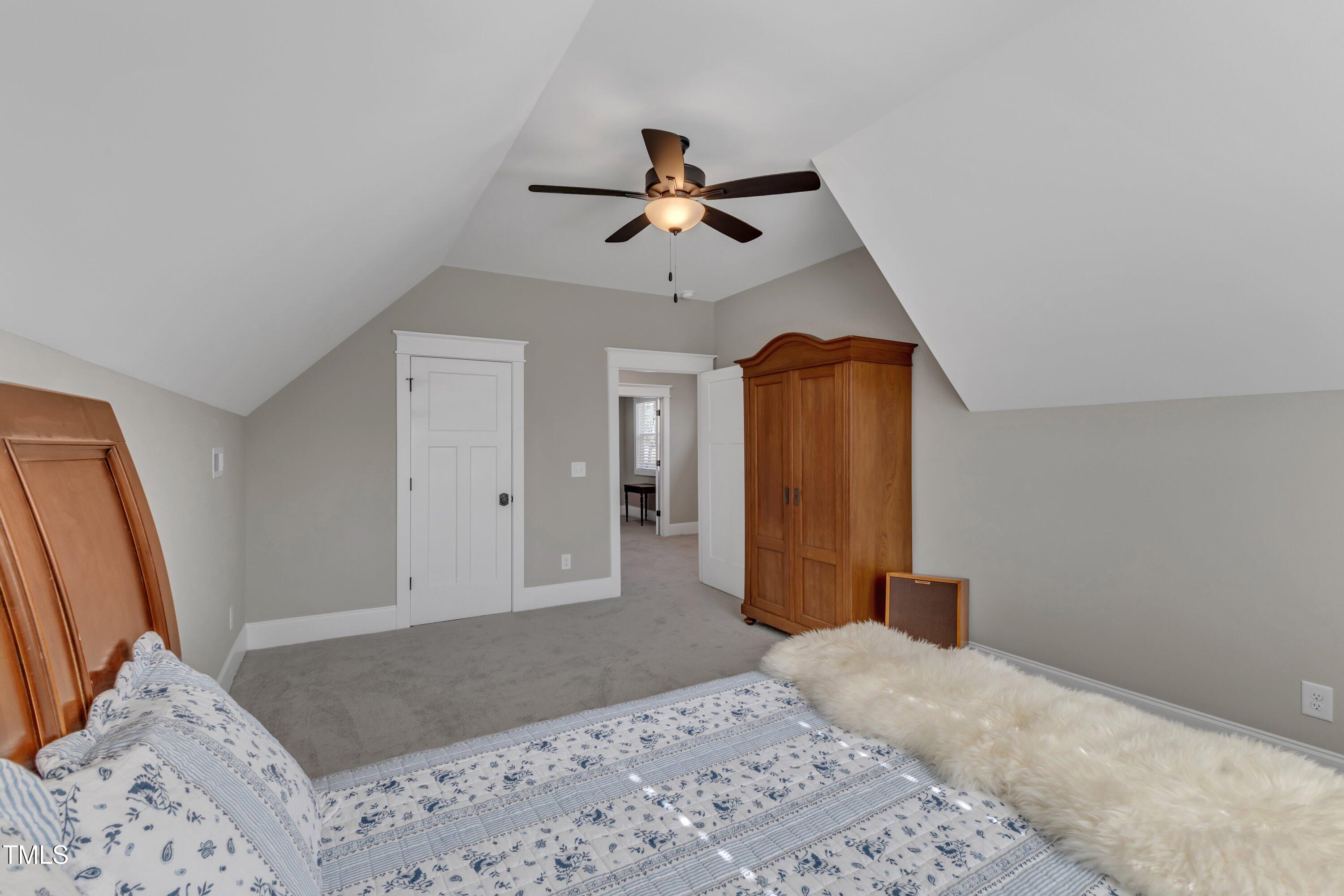 3608 Buzzard Road Wendell, NC 27591 - Photo 53 of 98 a bedroom with a bed and a dresser
