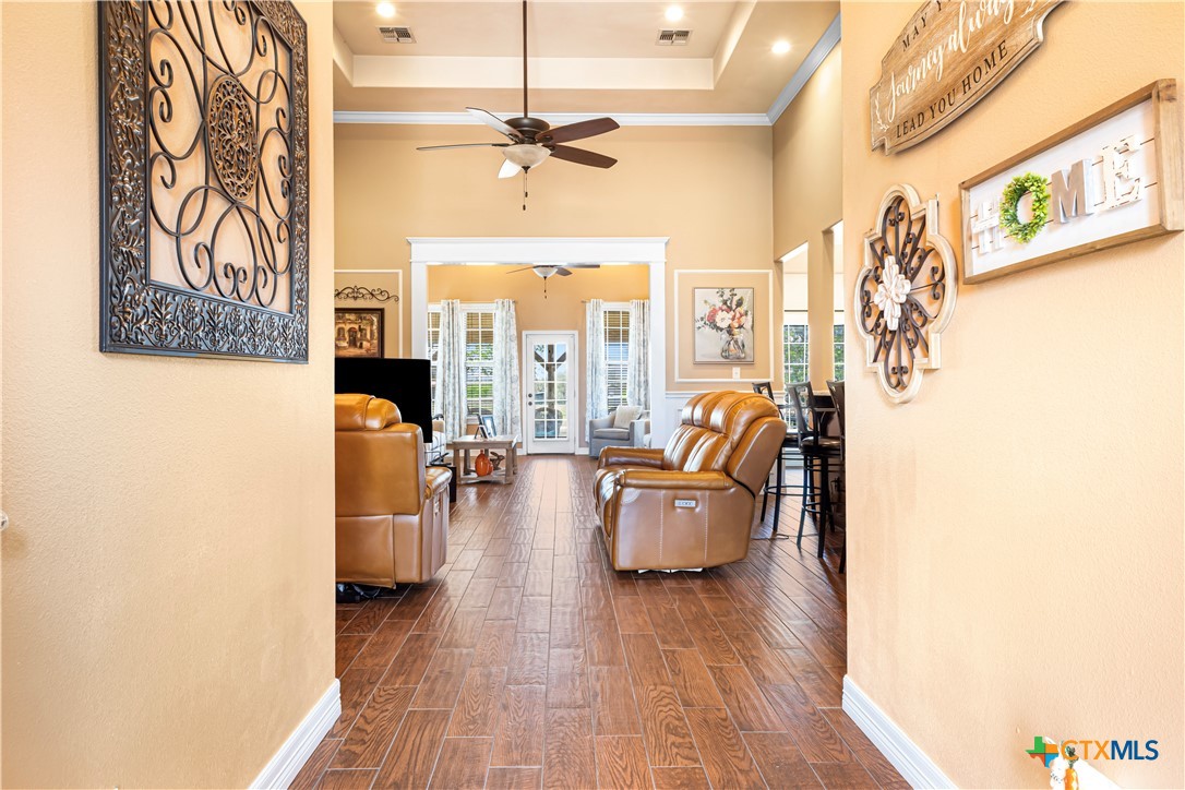 790 Spanish Grant Road Goliad, TX 77963 - Photo 4 of 41 a living room with furniture and a chandelier