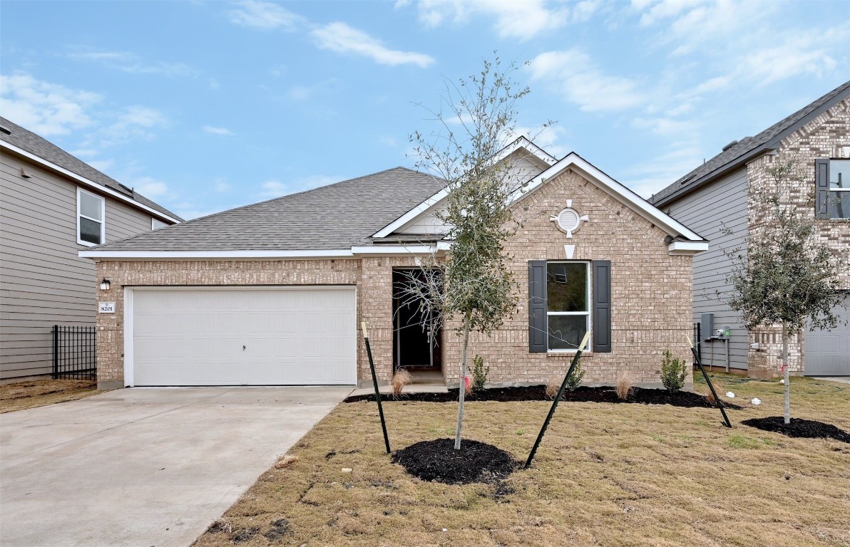 8201 Philbrook Drive Austin, TX 78744 - Photo 1 of 1 a house with garden space