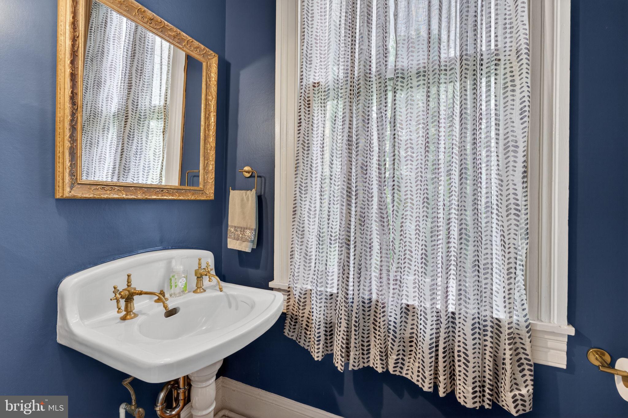 605 West Joppa Road Towson, MD 21204 - Photo 31 of 98 Charming half-bath with vintage flair.
