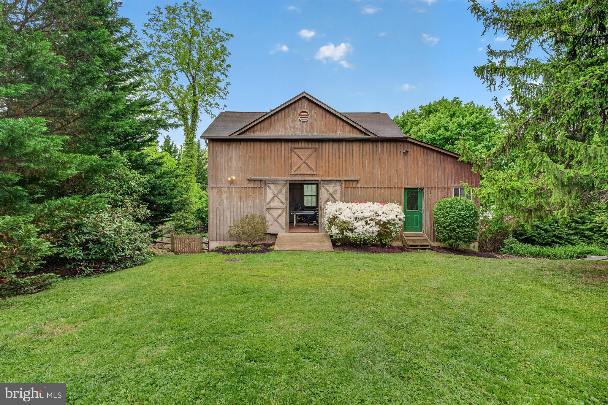 605 West Joppa Road Towson, MD 21204 - Photo 68 of 98 Charming rustic home amidst lush greenery.