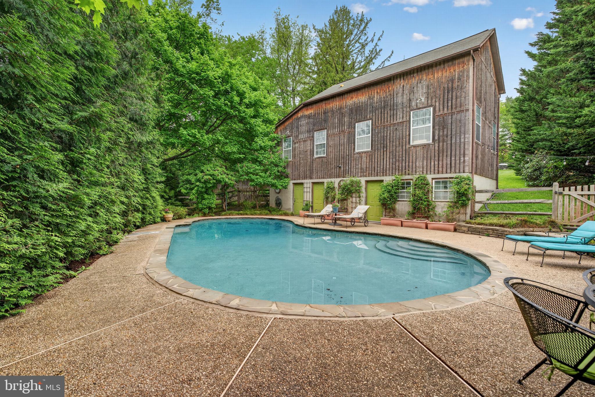 605 West Joppa Road Towson, MD 21204 - Photo 78 of 98 Serene retreat with a tranquil pool.