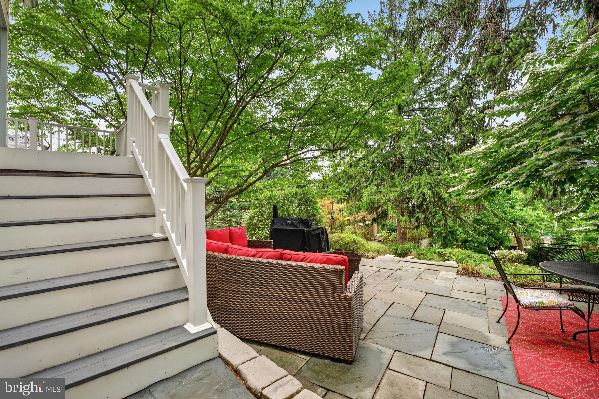 605 West Joppa Road Towson, MD 21204 - Photo 82 of 98 Serene patio nestled in lush greenery.
