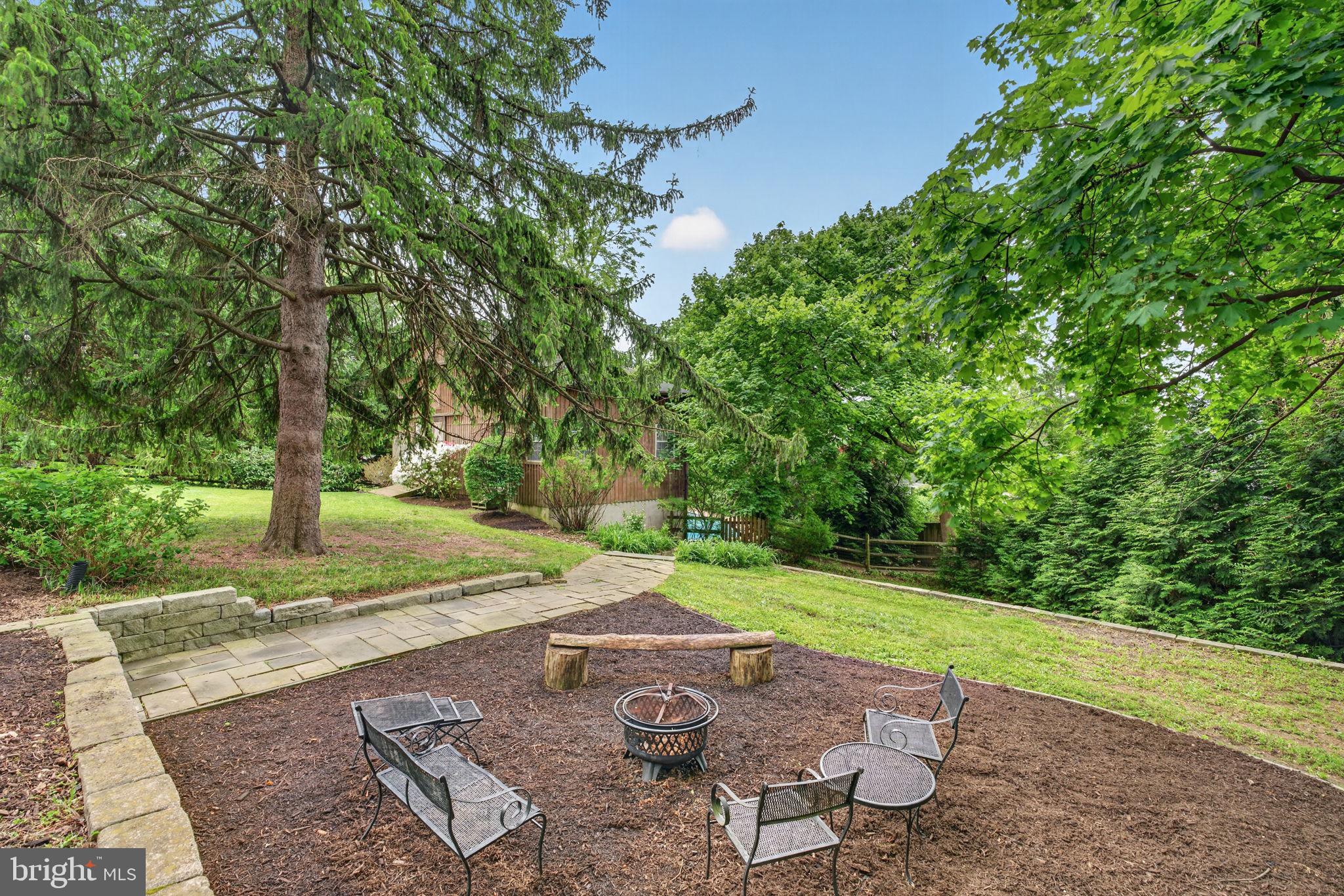 605 West Joppa Road Towson, MD 21204 - Photo 89 of 98 Serene backyard fire pit retreat.