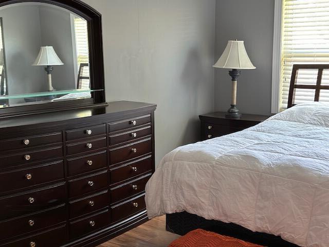 4585 Northwest 3rd Street, Unit D Delray Beach, FL 33445 - Photo 35 of 42 a bedroom with a bed and a window