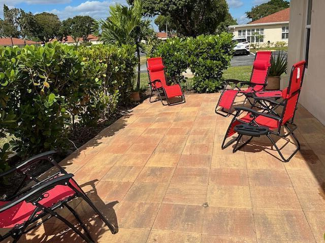 4585 Northwest 3rd Street, Unit D Delray Beach, FL 33445 - Photo 38 of 42 a view of outdoor space with seating