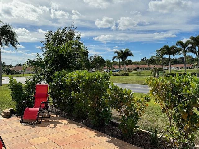 4585 Northwest 3rd Street, Unit D Delray Beach, FL 33445 - Photo 39 of 42 a garden view