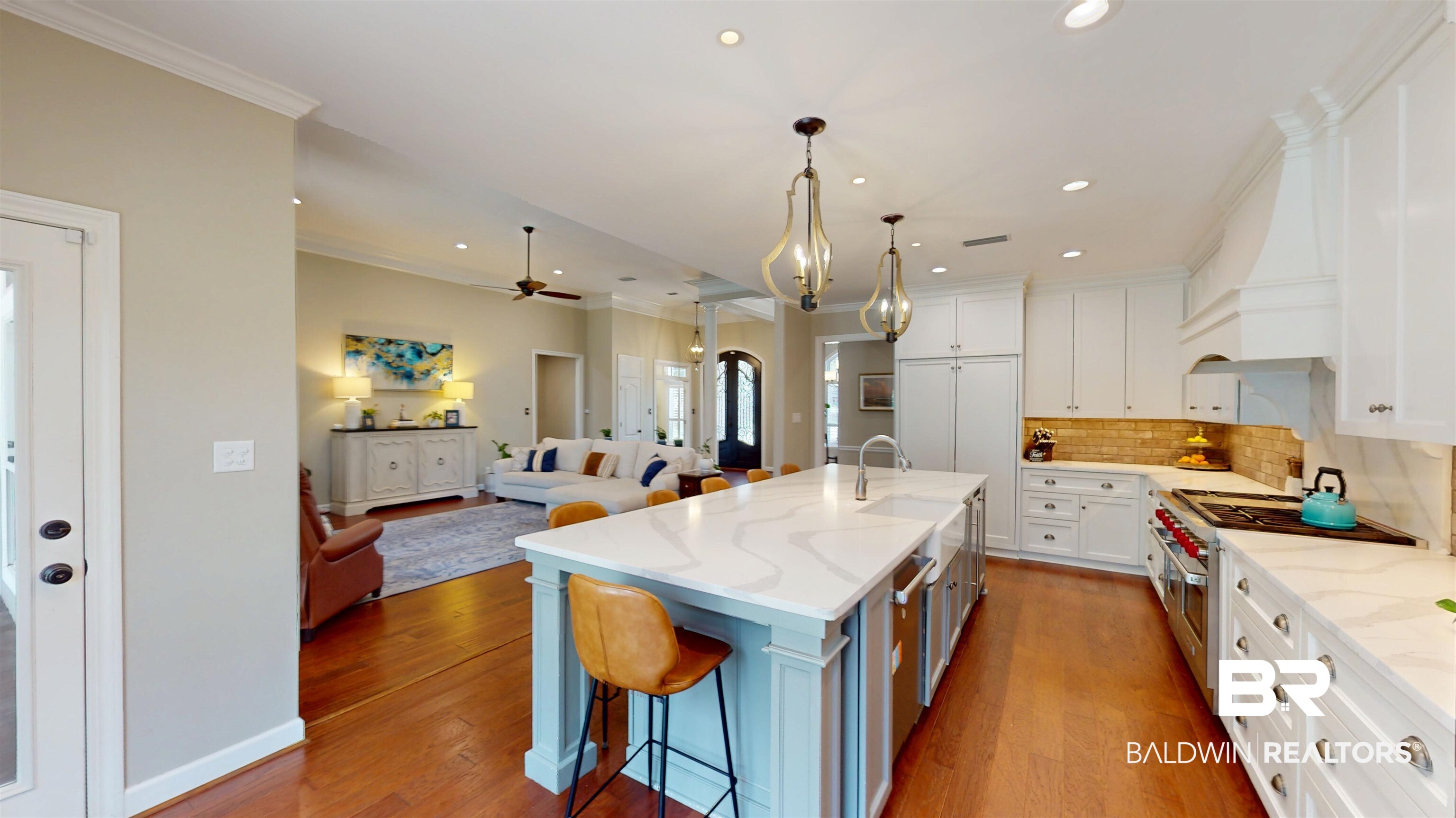 8775 Dawes Lake Road North Mobile, AL 36619 - Photo 12 of 59 Kitchen featuring decorative backsplash, ornamental molding, ceiling fan, wood finished floors, and white cabinetry