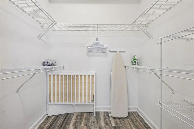 a view of balcony with wooden floor