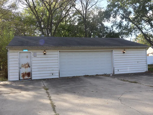 a view of a house with a garage