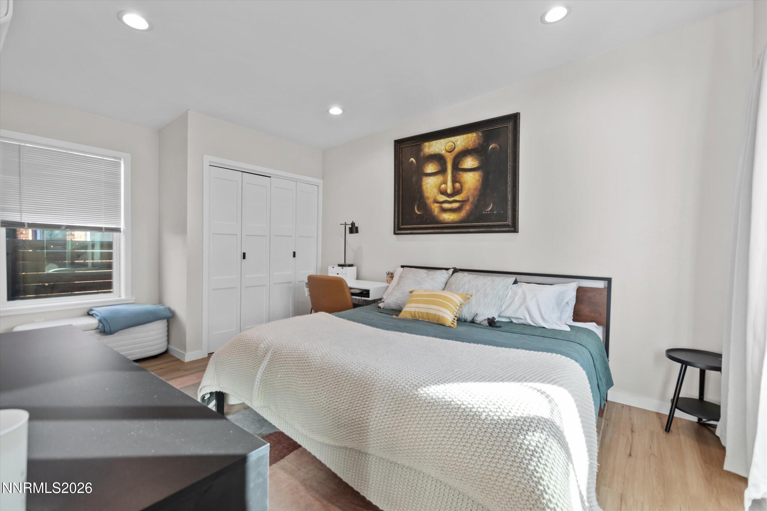 536 Sinclair Street Reno, NV 89501 - Photo 8 of 24 a bedroom with bed and a couch