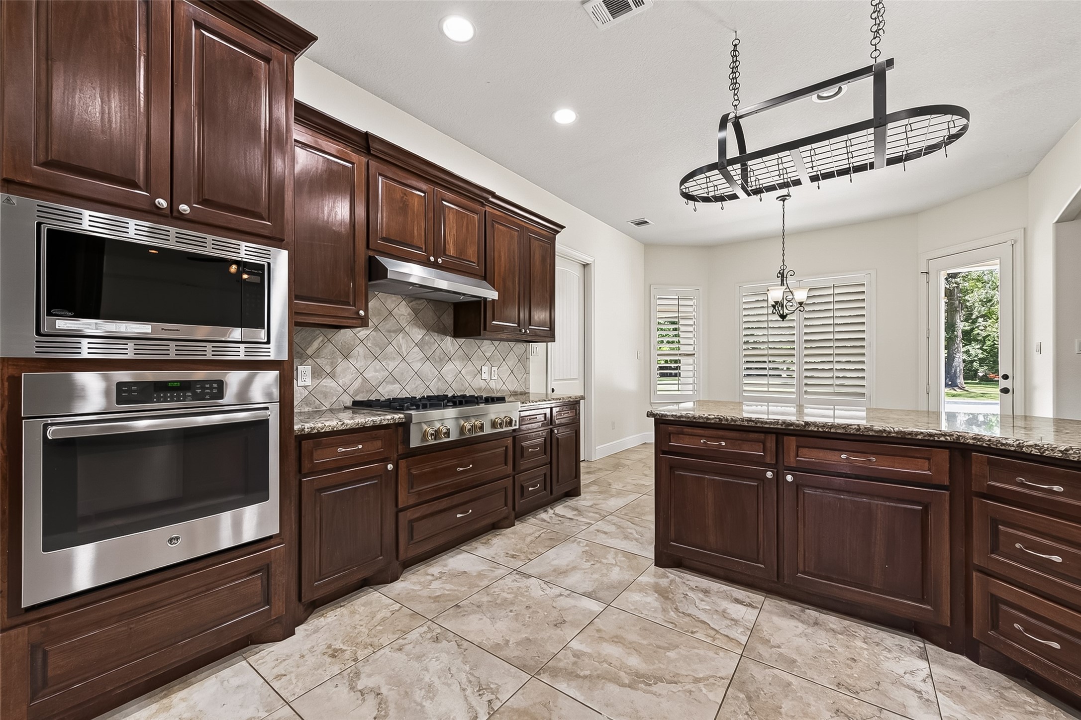 22040 Robins Road Hockley, TX 77447 - Photo 13 of 44 Kitchen with stainless steel appliances and built in oven plus gas top stove