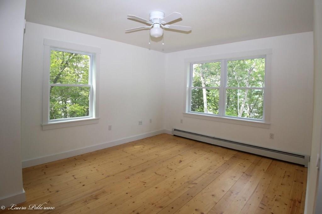 282 Newbury Neck Road Surry, ME 04684 - Photo 14 of 26 Second floor bedroom with bath.