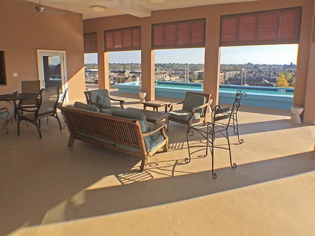 505 Tennessee Street, Unit 213 Memphis, TN 38103 - Photo 31 of 33 a living room with furniture and floor to ceiling windows