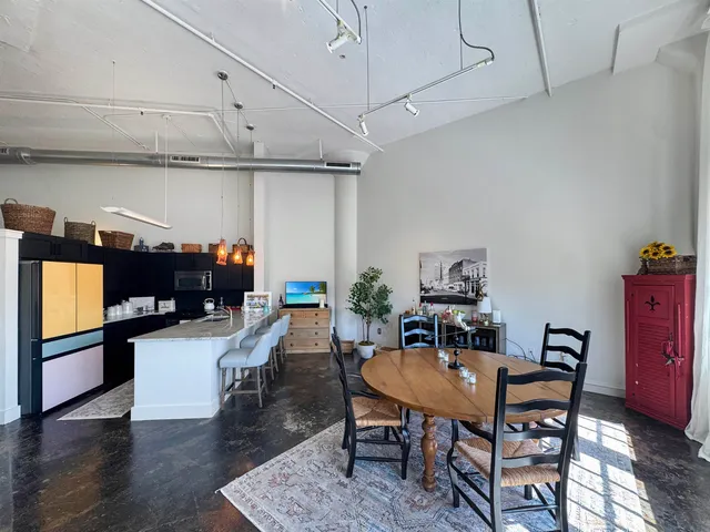 a view of a dining room with furniture