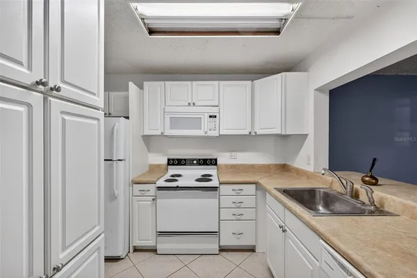$140,000 | 1398 Shady Pine Way, Unit A1, Tarpon Springs, FL 34688