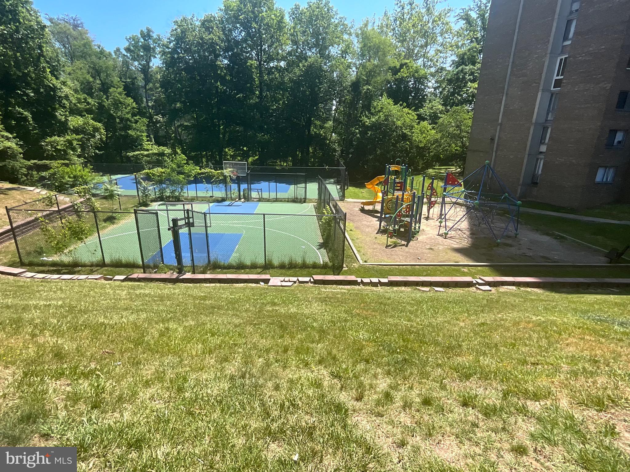 1836 Metzerott Road, Unit 1905 Adelphi, MD 20783 - Photo 14 of 15 Outdoor playground basketball and tennis court