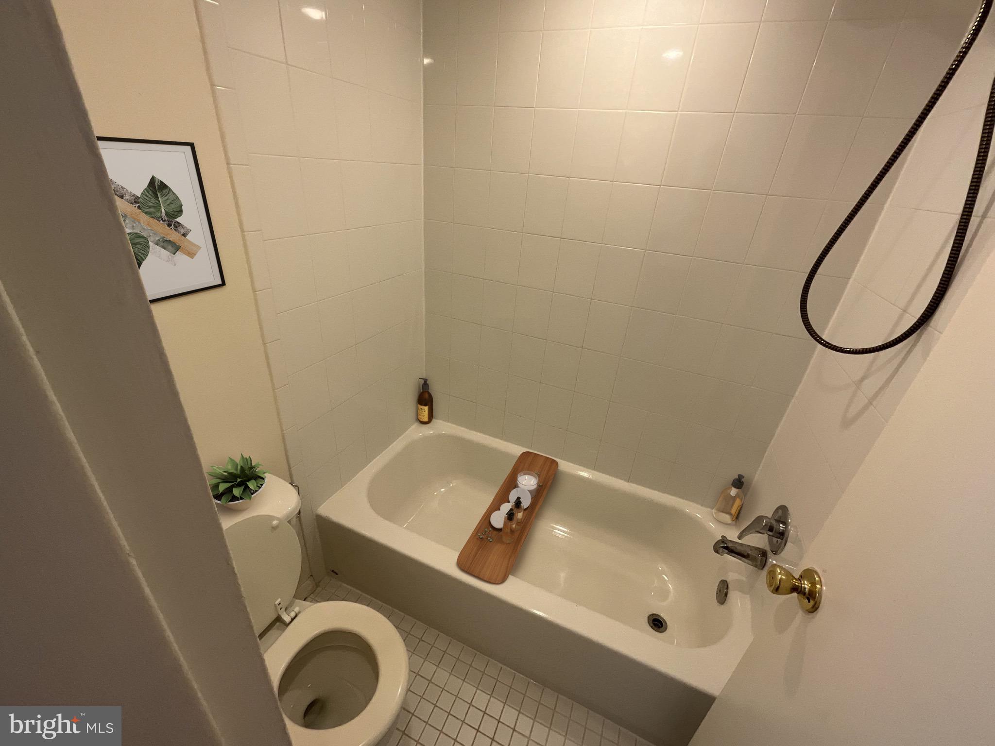 1836 Metzerott Road, Unit 1905 Adelphi, MD 20783 - Photo 3 of 15 Bathroom and Tub
virtual staging