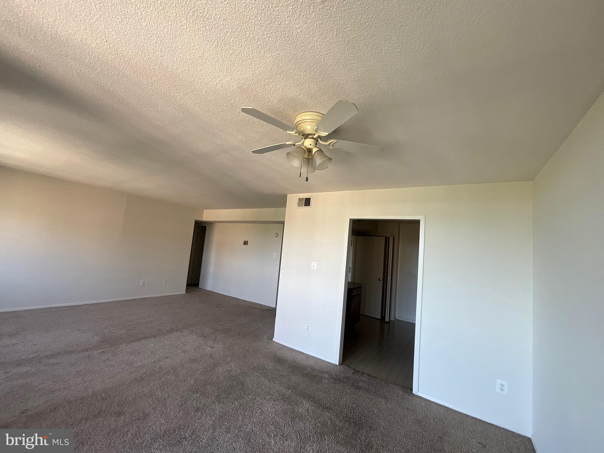1836 Metzerott Road, Unit 1905 Adelphi, MD 20783 - Photo 7 of 15 Living virtual staging Room Ceiling fan