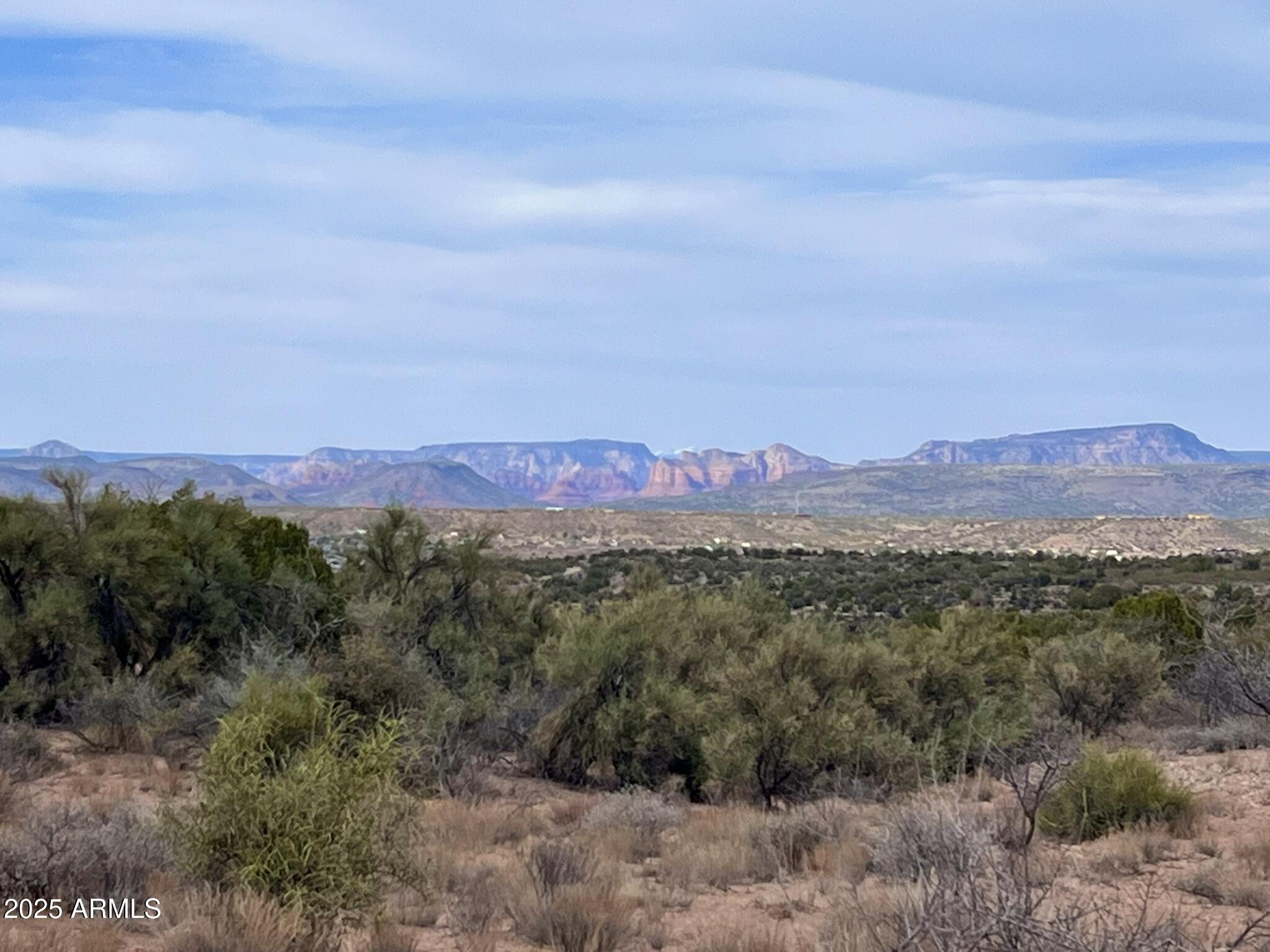 3075 Sonora Pass, Unit 65 Rimrock, AZ 86335 - Photo 17 of 17 a view of a town with mountains in the background