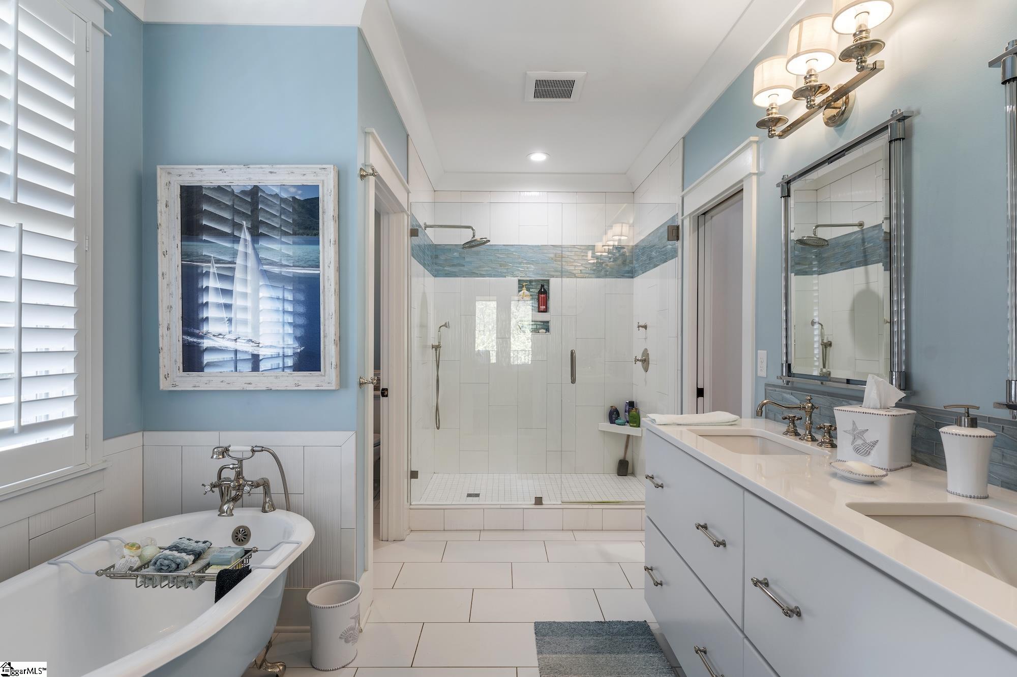 158 Tully Drive Anderson, SC 29621 - Photo 18 of 49 Stunning blue and white claw-foot bathtub, spacious walk-in tiled shower, double vanity, tile flooring and walk-in closet.