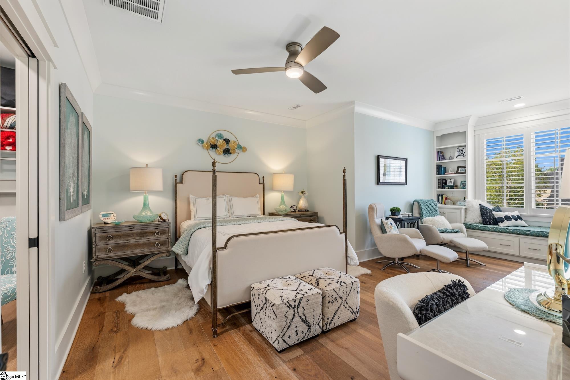 158 Tully Drive Anderson, SC 29621 - Photo 28 of 49 Spacious bedroom on 2nd floor. Wood floors, sitting area, window seat, built-in bookcases and walk-in closet